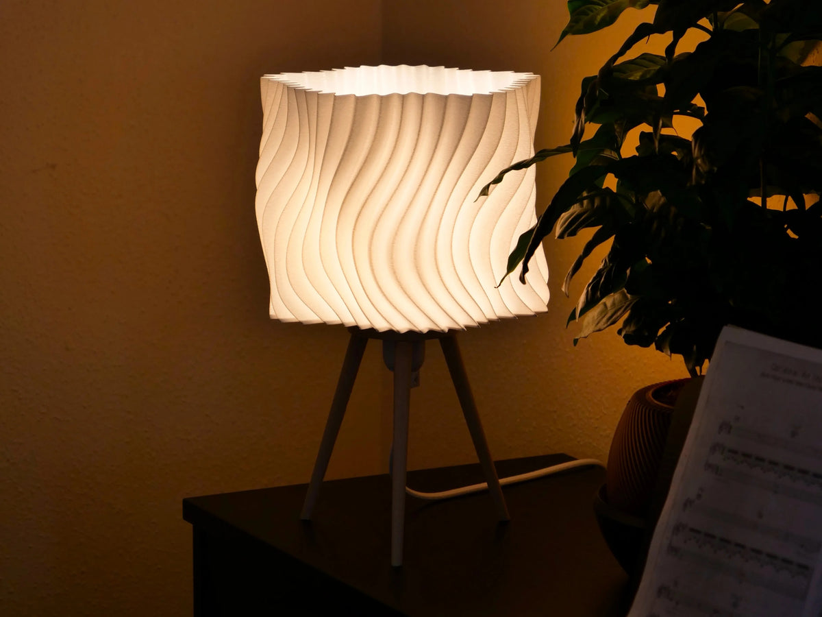Sway Tripod lamp — lights on