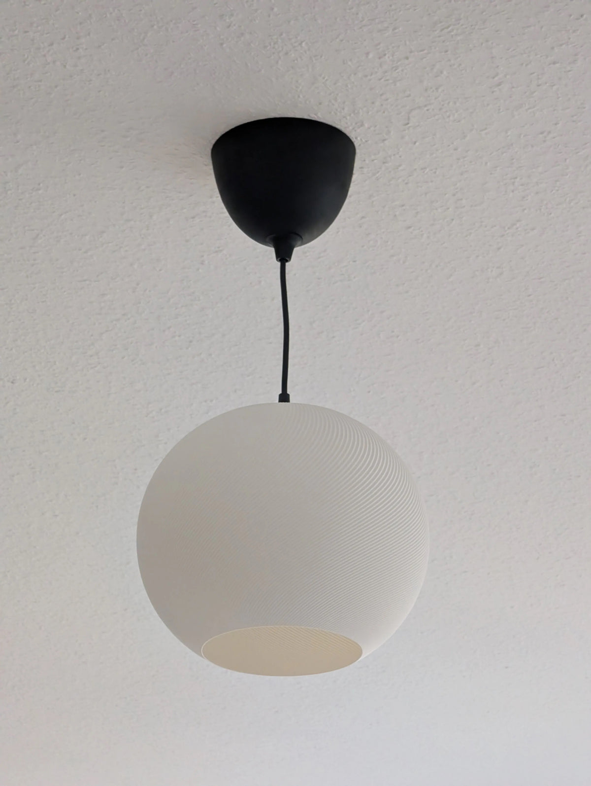 Orbit Globe lamp — daytime view